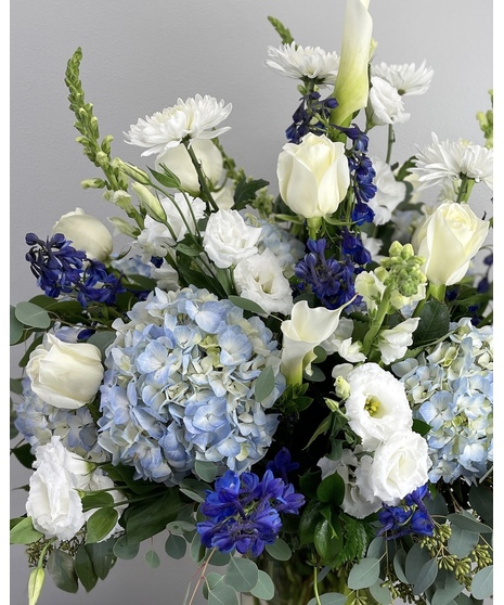 white and blue floral arrangement