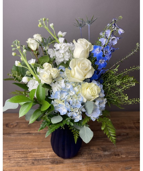 white and blue floral arrangement