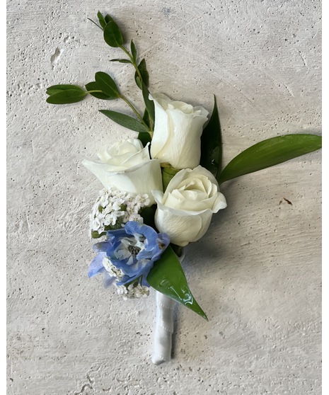 peach toned boutonniere