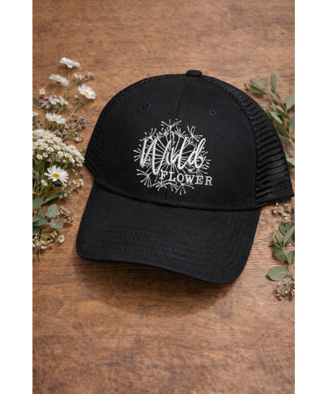 WildFlower custom trucker hats featuring an embroidered logo. Available in Black or Gray and Camel with adjustable mesh backs.