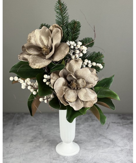 Silk holiday cemetery arrangement in a cone; available in burgundy poinsettia or gold magnolia styles with winter greenery.