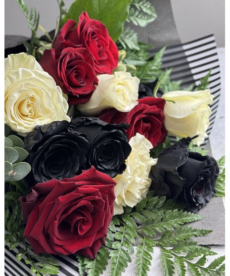 Custom floral bouquet designed with your school colors; flowers and style will vary based on availability.  