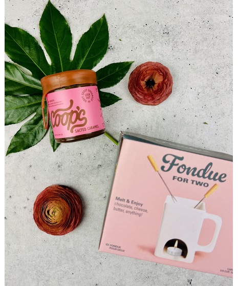 Ceramic fondue set for two with dipping forks and choice of chocolate fudge or caramel sauce.