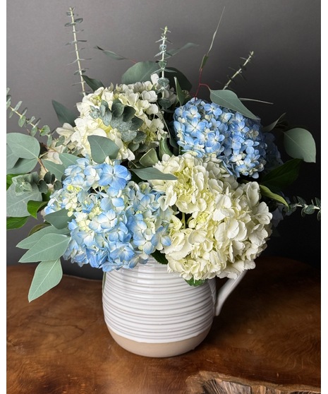 white and blue floral arrangement