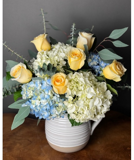 white and blue floral arrangement