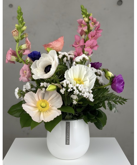 Seasonal arrangement of Maryland and American-grown flowers in a designer’s choice style. Each is unique and freshly made.
