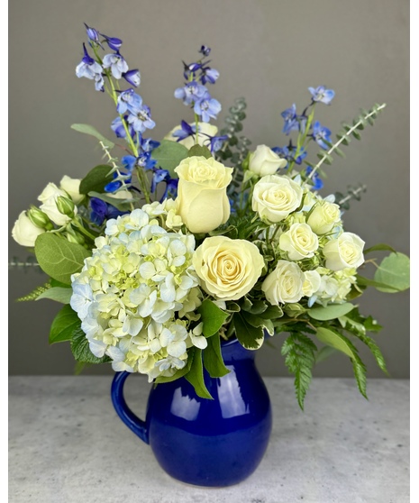 white and blue floral arrangement