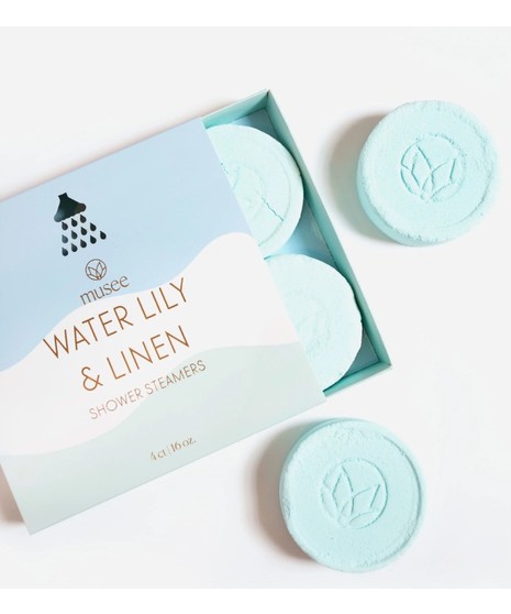 Round shower steamer tablets used to release fragrance and create a spa-like shower experience.