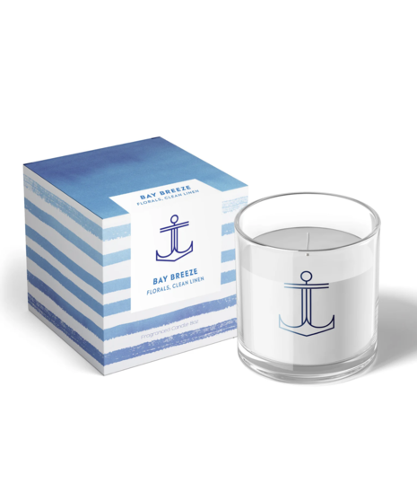 A collection of candles with minimalist glass vessels, featuring coastal scents like Sea Salt, Sand, and Bay Breeze. Handcrafted in Annapolis, MD.