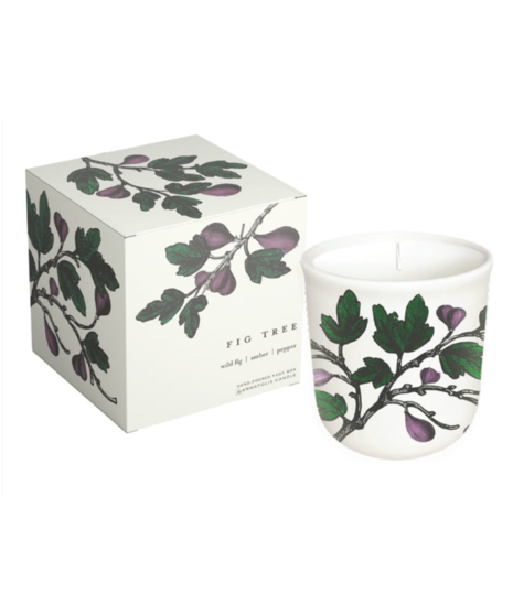 Glass soy candle with botanical lemon tree artwork, packaged in a matching illustrated box.