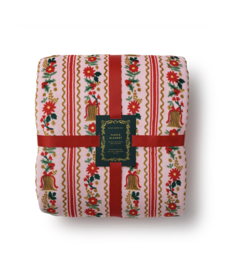 Soft fleece throw blanket featuring colorful patterned designs by Rifle Paper Co.