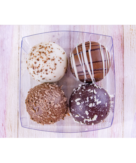 Box of assorted chocolate truffles by Wockenfuss Candies, available in 4-count or 8-count gift boxes.