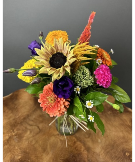 Seasonal arrangement of Maryland and American-grown flowers in a designer’s choice style. Each is unique and freshly made.