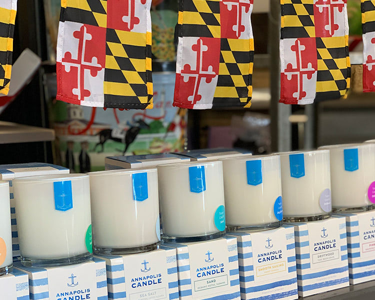 Maryland flags and Annapolis candles on display in our showroom